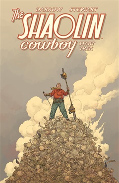 A man standing atop a mountain of bones with a two sided chainsaw.