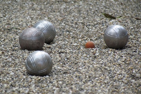 Four Silver Petanque Balls.