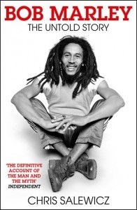 Book cover, Bob Marley Sitting cross legged. Bob Marley The Untold Story By Chris Salewicz.