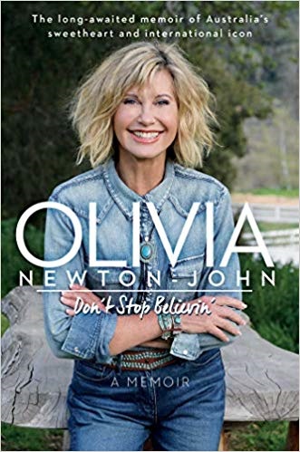Book cover of Olivia Newton John wearing country clothes. 